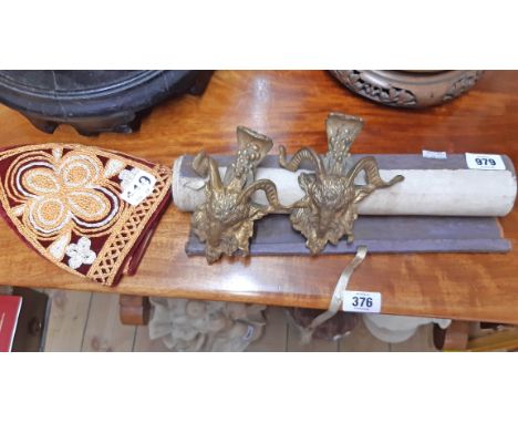 A 20th Century Chinese scroll - sold with a pair of decorative gilt brass goat mask fittings and a Chinese embroidered hat