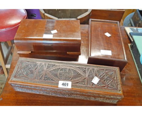Three wooden boxes comprising Indian carved glove box, 1930's cigarette box and a mahogany chess piece box with sliding top a