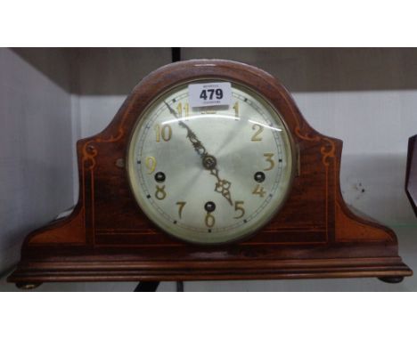 A mid 20th Century inlaid walnut cased mantel clock with eight day chiming movement
