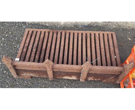 An old cast iron fire grate