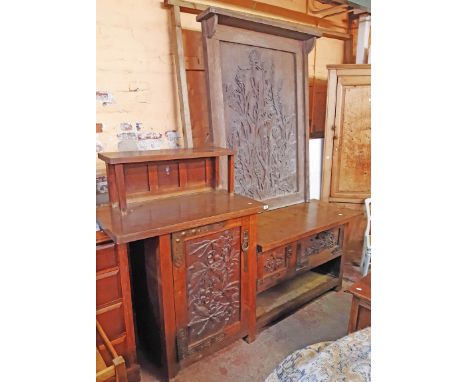 A 7' 6" Arts &amp; Crafts heavy oak sideboard the currently detached raised back section featuring high relief thistle decora