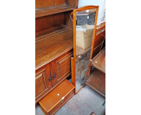 A Stag light stained wood framed cheval mirror the detatched base with drawer and bracket feet