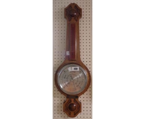 A 20th Century varnished oak Comitti of London banjo barometer/thermometer with aneroid works - presentation plaque to front