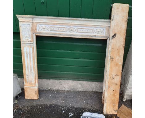 A large cast iron fire surround