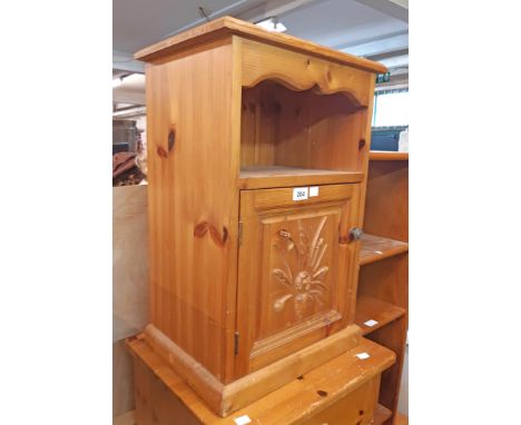 A modern pine bedside cabinet with decorative panel door - sold with a Stag style bedside table and a three shelf open unit -