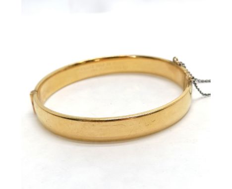 Vintage rolled gold 20 micron bangle with engraved detail to front in overall good condition - 14g total weight - SOLD ON BEH