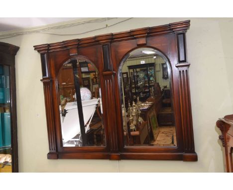 Twin mirrored overmantel mirror of architectural form, 110cm by 138cm