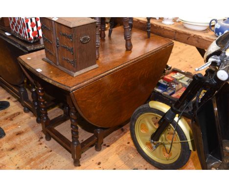 Oak barley twist gate leg dining table