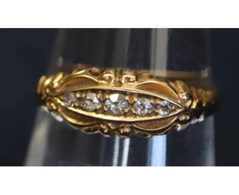 An 18ct gold and diamond five stone ring, 2.6g approx. (B.P. 24% incl. VAT)