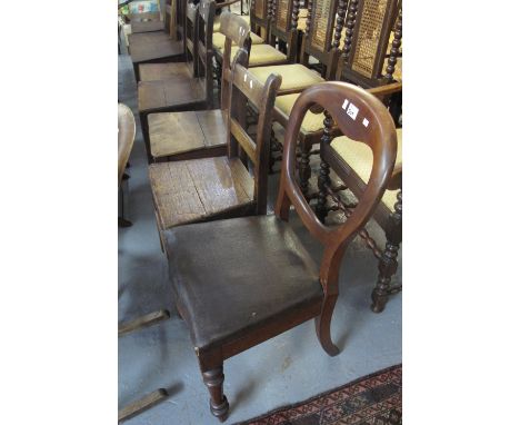 A collection of 19th Century oak bar back and stick back farmhouse kitchen chairs, together with a cane rocking chair and a V