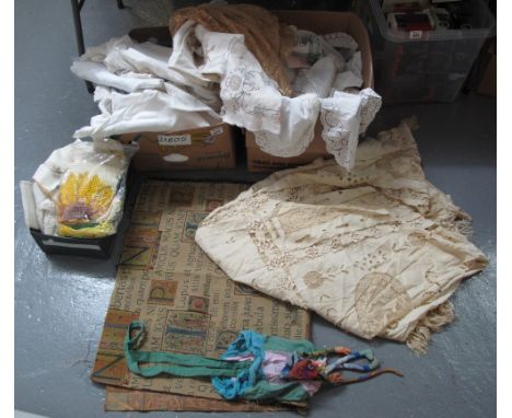 Two boxes of vintage fabrics to include; crochet tablecloths, embroidered, lace and printed talbeware, a Cadw jacquard woven 