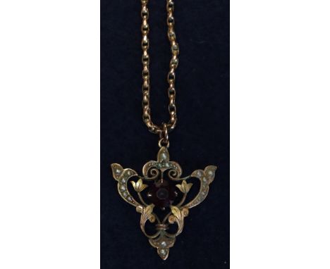 A 9ct gold Art Nouveau amethyst and seed pearl pendant on a 9ct gold chain. 10.3g approx in total. (B.P. 24% incl. VAT)
