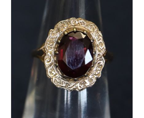 A silver gilt garnet set ring.(B.P. 24% incl. VAT)