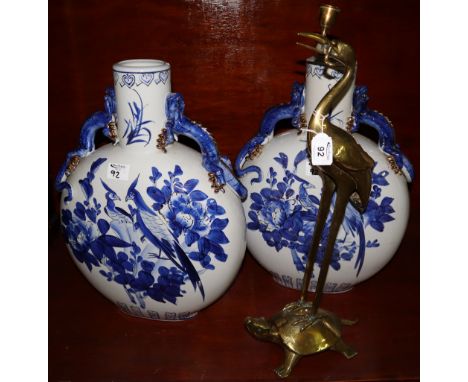 Brass stork on turtle candlestick, together with a pair of modern blue and white porcelain Chinese style moon flasks. (3) (B.