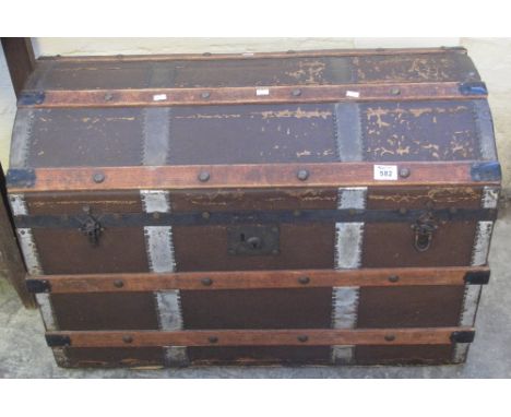 Caned canvas covered domed travelling trunk.(B.P. 24% incl. VAT)