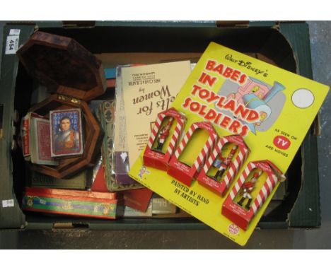 Box of assorted items to include; vintage playing cards, Babes in Toyland soldiers by Walt Disney, vintage domino set, Miller