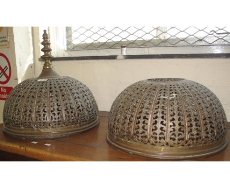 Two Middle Eastern design pierced foliate brass ceiling light shades. (B.P. 24% incl. VAT)