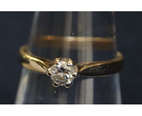 A 9ct gold and diamond solitaire ring. Weight 2.2g approx. (B.P. 24% incl. VAT) CONDITION REPORT: Diamond is very roughly 4.3