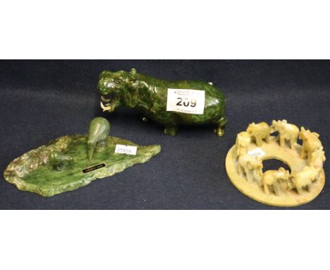 Carved hardstone (jade) figure of a hippopotamus, an elephant ornament in carved hardstone and a similar carved hardstone kiw