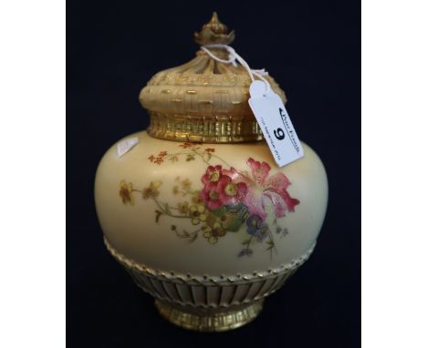 Royal Worcester porcelain blush ivory pot pourri vase and cover having gilded relief cane work decoration and painted flowers