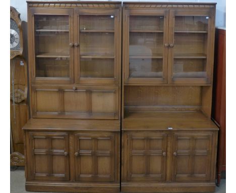 A pair of Ercol Golden Dawn elm bookcases 