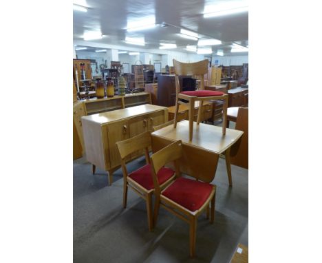 A G-Plan Brandon light oak dining suite, comprising; sideboard, drop-leaf table and four chairs 