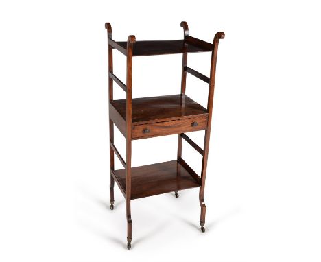 A Regency mahogany three tier what-not, circa 1820, the middle tier incorporating a drawer, 126cm high, 51cm wide, 47cm deep 