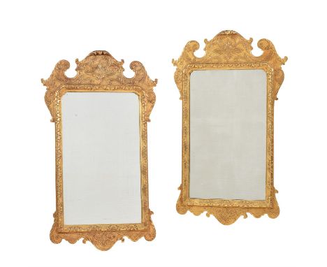 A pair of giltwood wall mirrors in George II style, late 20th century, 89cm high, 47cm wideCondition Report: Marks, knocks, s