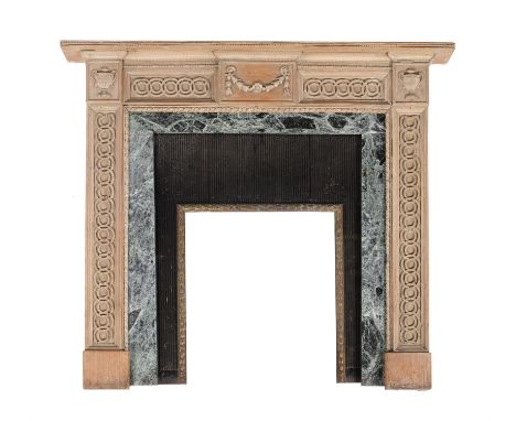 A stripped wood, probably Lime, chimney piece in George III style, 19th century, with applied moulded decoration, the apertur