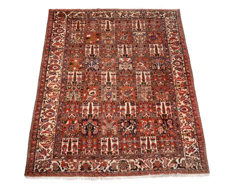 A Joshogan carpet, woven in the Persian Garden pattern, approximately 312 x 235xm