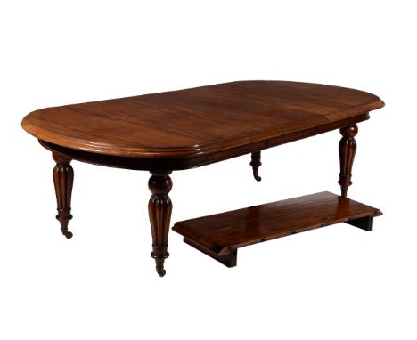 A Victorian mahogany extending dining table, second half 19th century, with two additional leaf insertions, 75cm high, 126cm 