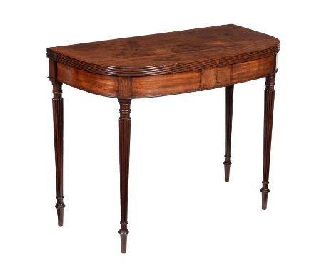 A George IV mahogany card table, circa 1825, attributed to Gillows of Lancaster, the top enclosing a baize playing surface, a