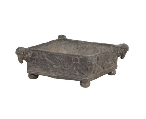 An English lead planter in Neoclassical taste, probably 18th century, the square section body cast with Bacchanalian putti an