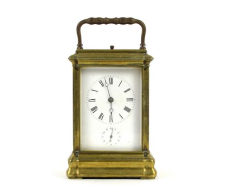 Late 19th / early 20th century brass gorge cased repeating carriage clock, the white enamel dial with Roman numerals and oute