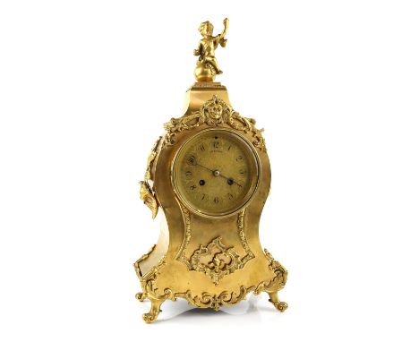Early 20th century gilt metal mantel clock, the gilt dial with Roman numerals signed J.W. Benson, the case with putto on a ba