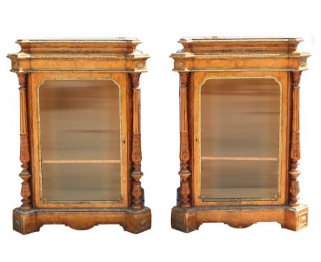 Pair of 19th century satinwood crossbanded and floral marquetry inlaid cabinets,with gilt metal mounts and twin carved column