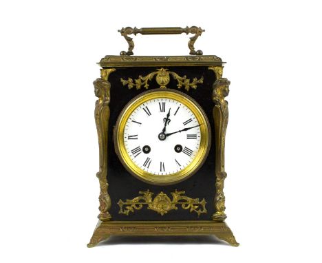 Late 19th/early 20th century French ebonised and cast metal mounted mantel clock, white enamelled dial with twin train moveme