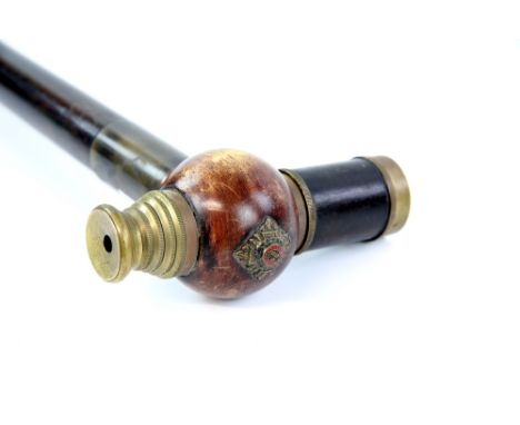 Early 20th century Telescope walking stick, the shaft with a turned wood ball handle with enamelled badge of 'Order of the Ba