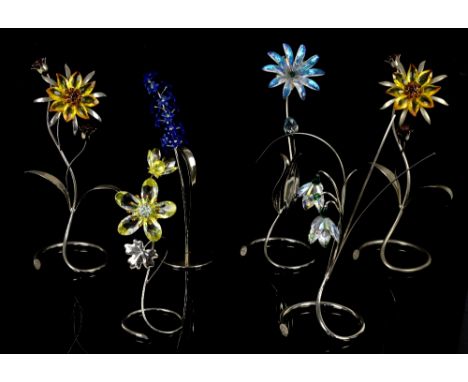 Swarovski crystal flowers including Dindori Saphhire no. 677990, Damarys Erinite, Deoria Yellow, Darigold Light Topaz x 2, an
