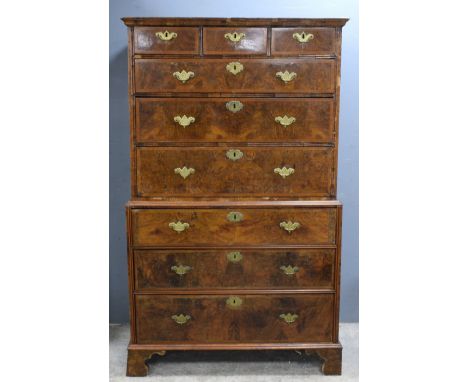 AMENDED DESCRIPTION Early Georgian walnut tallboy of three short over three long drawers the base with three further long gra