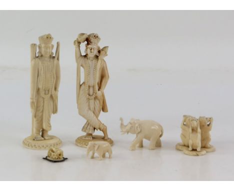 Two early 20th century Indian carved ivory figures, possibly chess pieces, three wise monkeys etc.,PLEASE NOTE: THIS ITEM CON