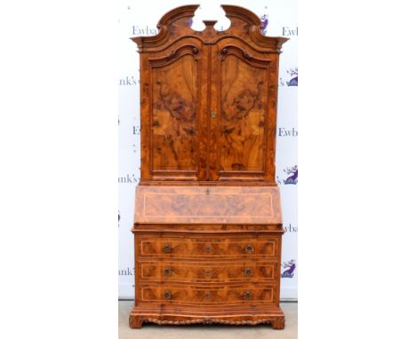 19th century style walnut bureau cabinet, the panelled cabinet doors enclosing central cupboard flanked by pigeon holes and s