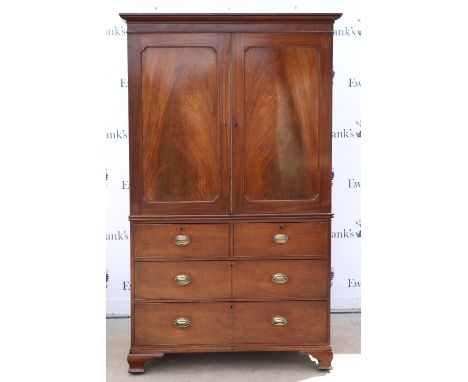 19th century mahogany linen press, the moulded cornice above two cupboard doors and two short over three long graduated drawe