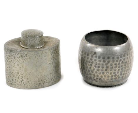 A Liberty &amp; Co Arts and Crafts pewter tea caddy, of oval form with circular lid, no. 0614, impressed marks beneath, 9.5cm