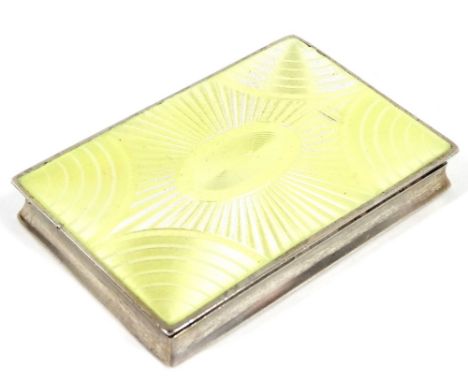 A 20thC enamel, white and gilt metal snuff box, of rectangular form, the tooled lid centred by an oval, with shaped semi circ