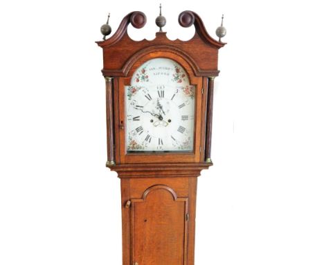 Sam Bycroft, Alford.  A 19thC oak longcase clock, the swan neck pedimented hood surmounted by three orb finials, above a long