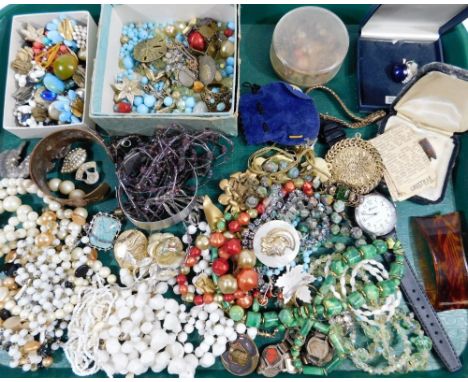 A quantity of costume jewellery and effects, to include scarf rings, dress rings, beaded necklaces, copper floral bangle, cli