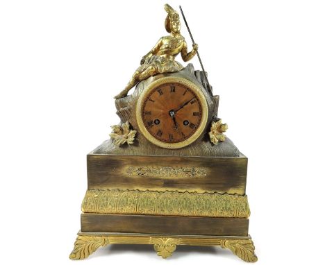 A late 19thC French gilt metal mantel clock, mounted with a figure of a Scotsman in kilt, etc., above an engraved dial with b