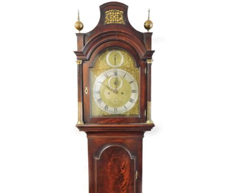 Kenneth Maclennan, London.  A late 18thC mahogany and flame mahogany longcase clock, the shaped hood with a blind fret flanke