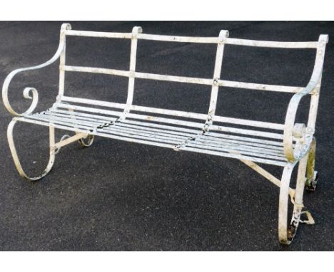 A Victorian wrought iron bench, partially slatted, with shaped back, scroll arms and shaped legs, painted white, 78cm H, 149c